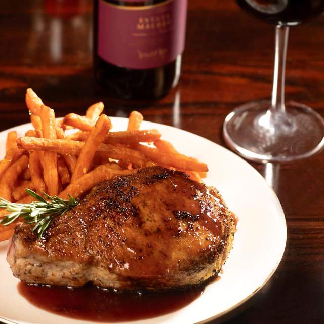 the-back-room-steakhouse-pork-chop.jpg