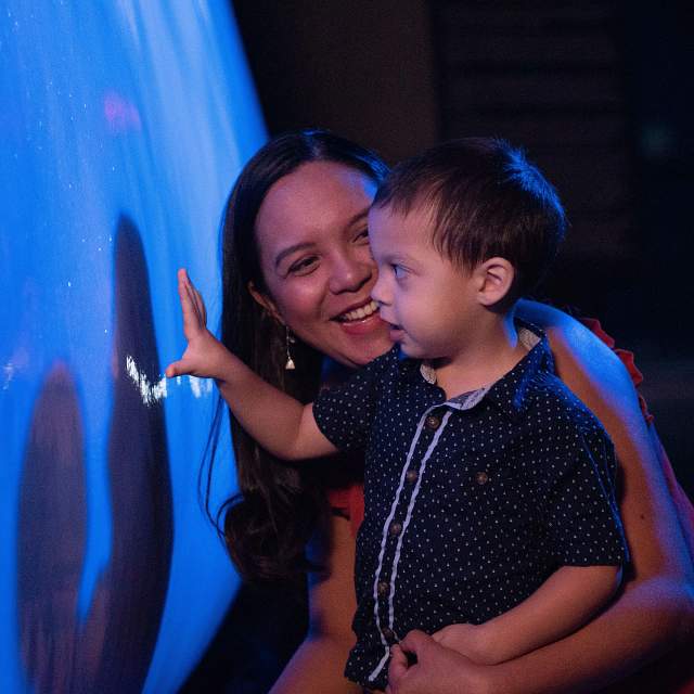 180369-mom-&-son-touch-ice.jpg