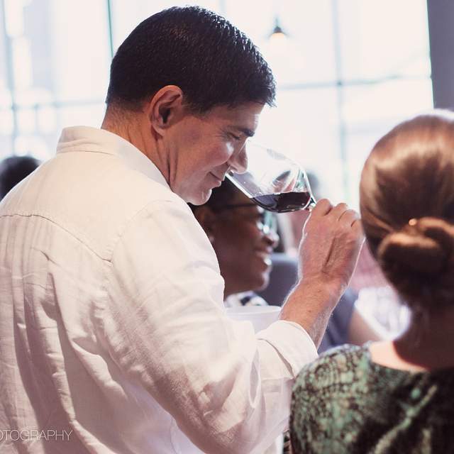 186362_george_smelling_wine.jpeg
