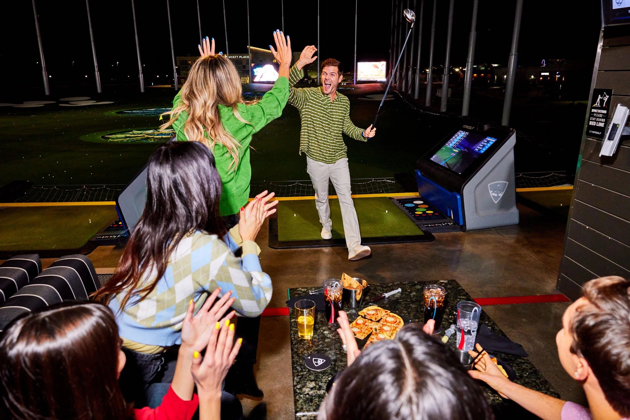Teeing it up at Topgolf Orlando - The Orlando Duo